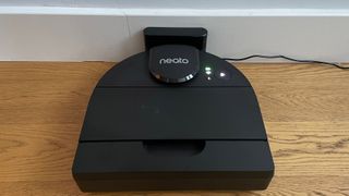 The Neato D9 on its charging station