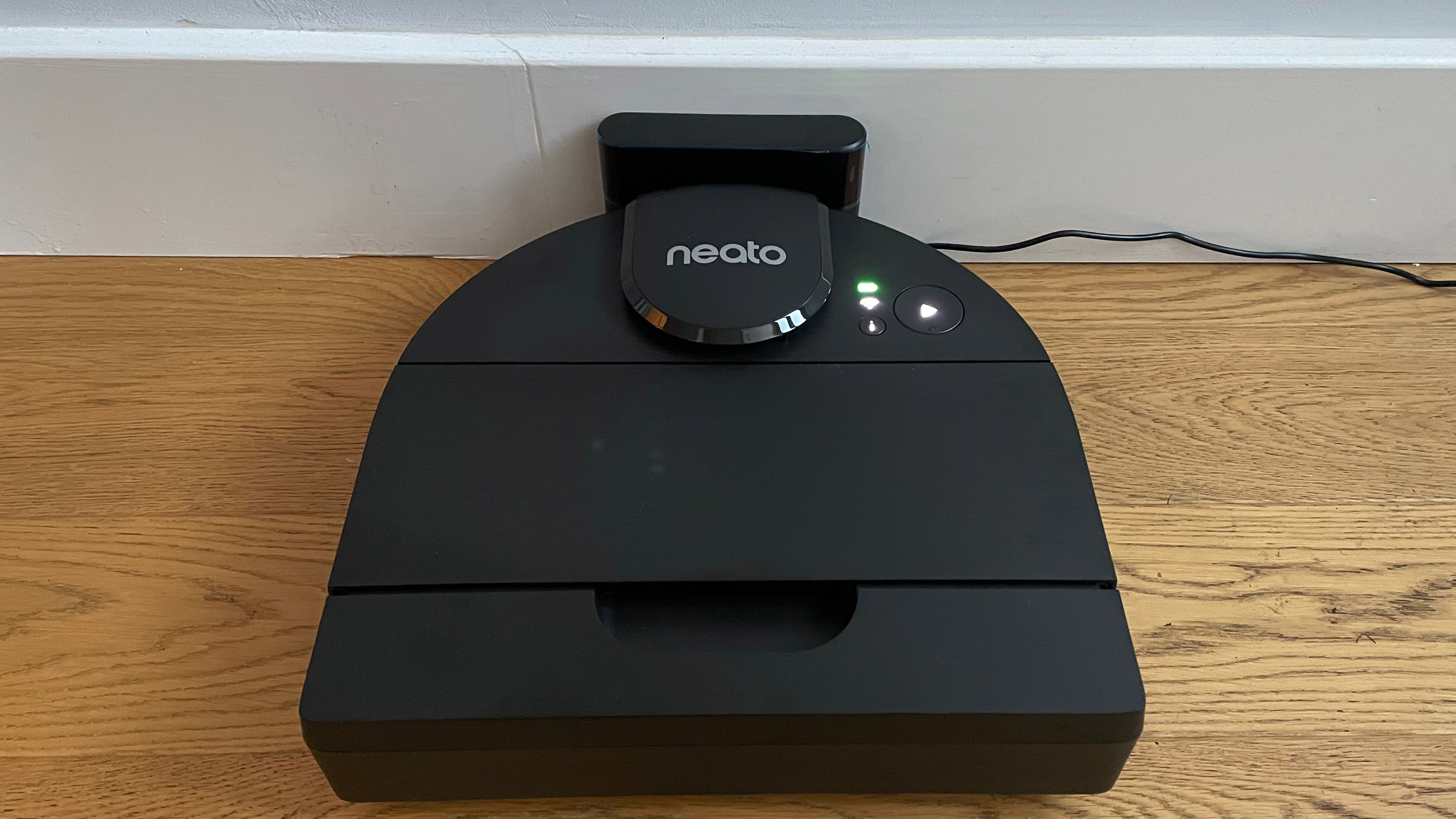 The Neato D9 on its charging station