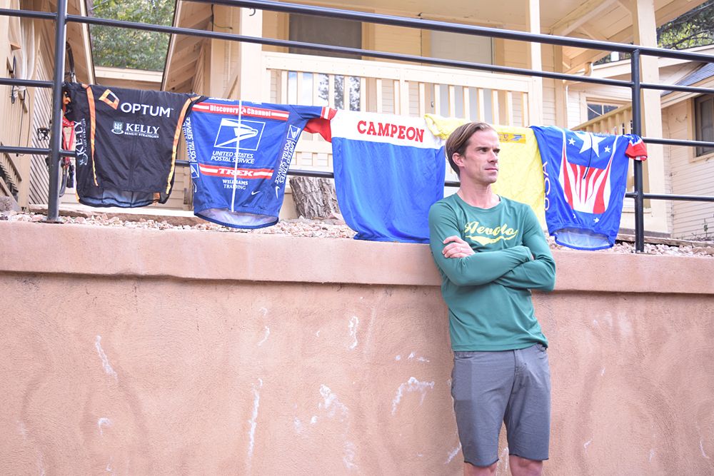 Aevolo team director Michael Creed stands by his collection of old team jerseys