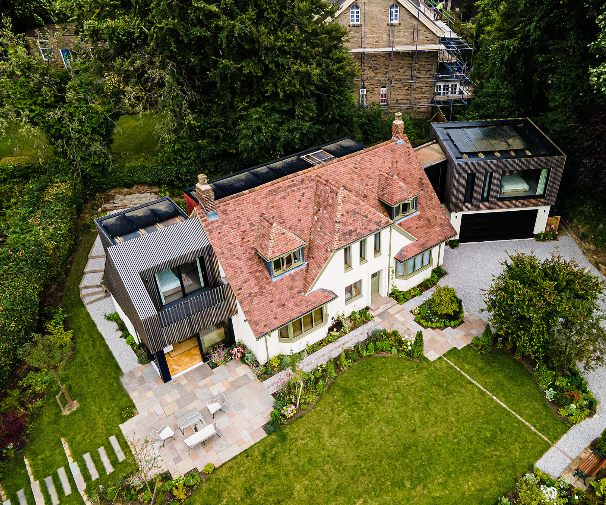 Birds eye view of the top of the property, lawn and patio