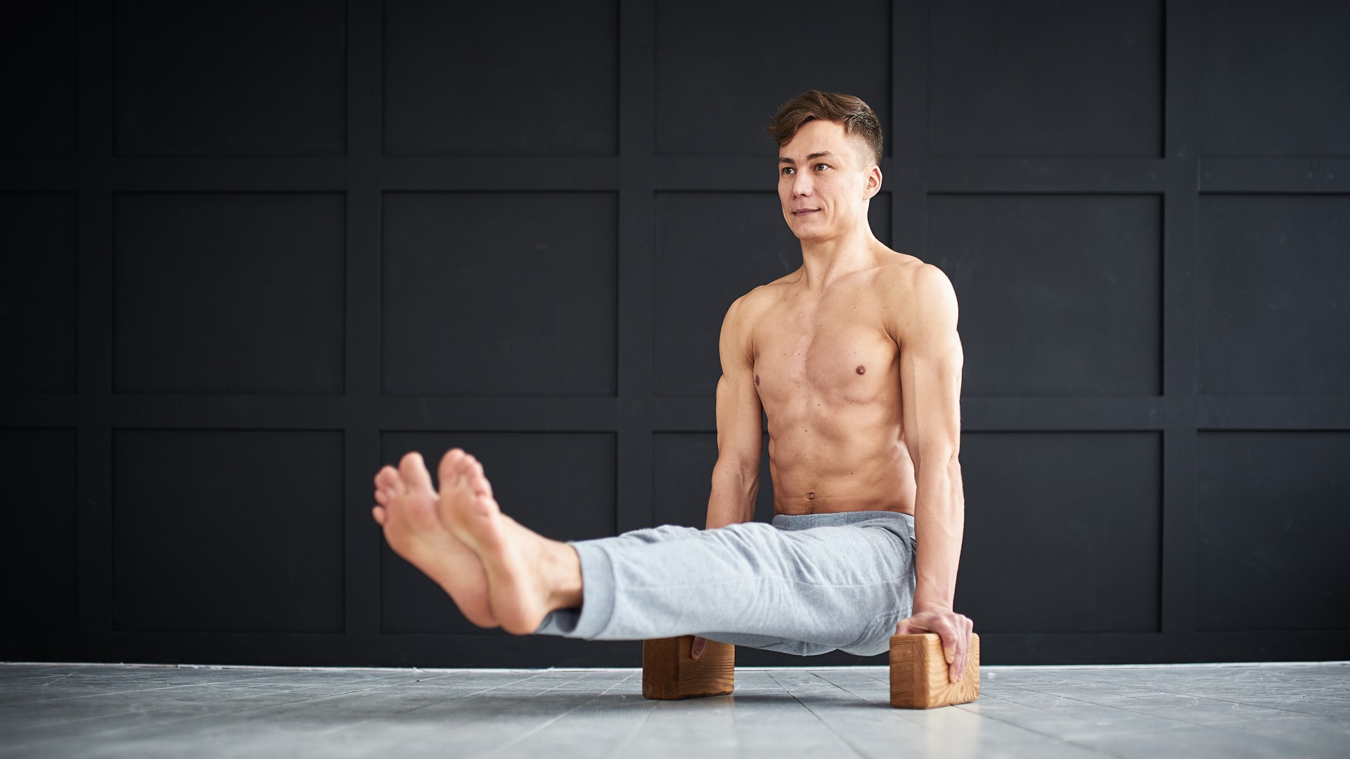 You don't need weights to strengthen your core — here's a 5-move abs workout you can do with a yoga block