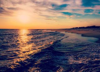 Beach sunset at Cape May, Delaware Bay.