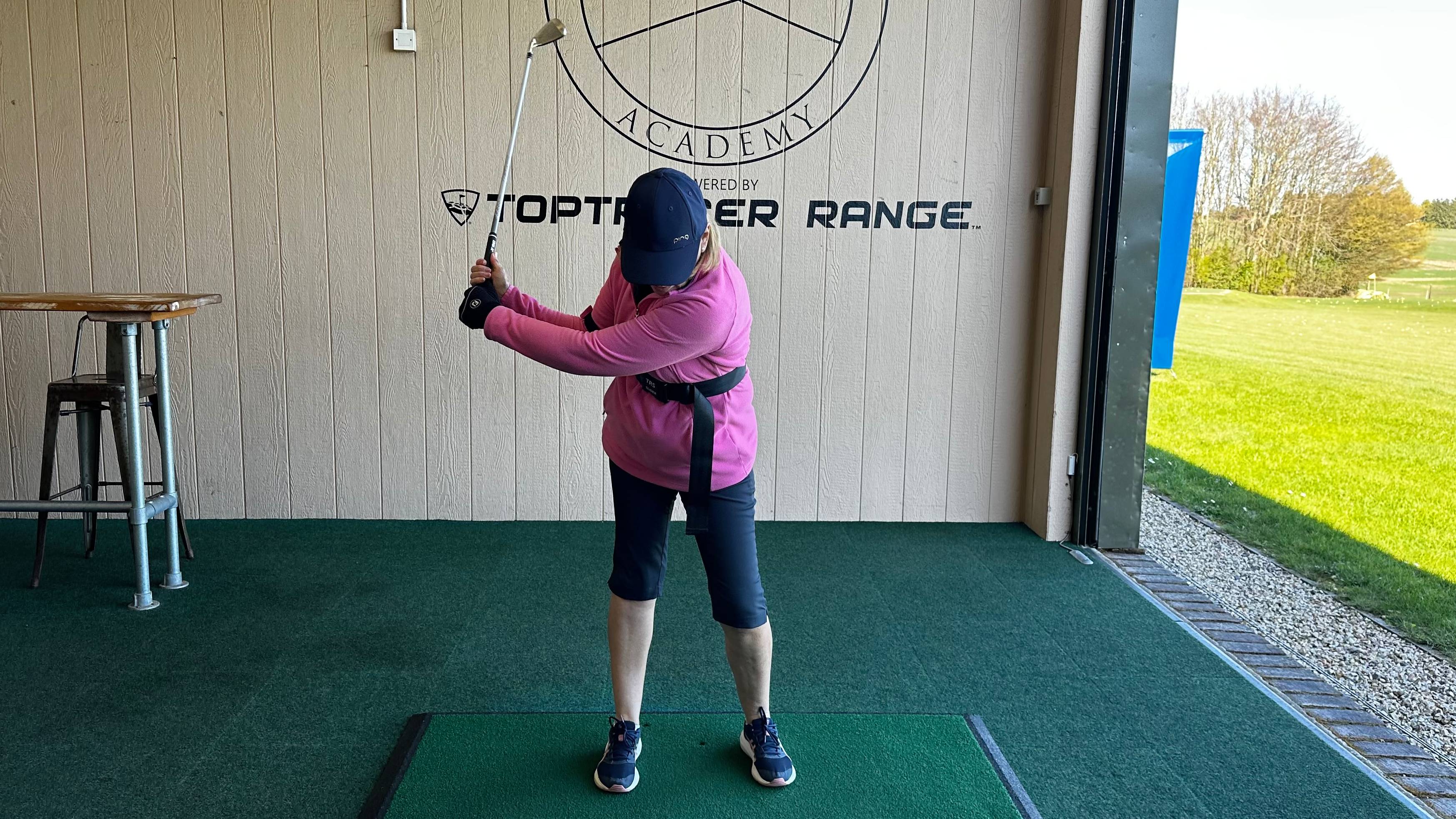 Female golfer using the TRS Slider