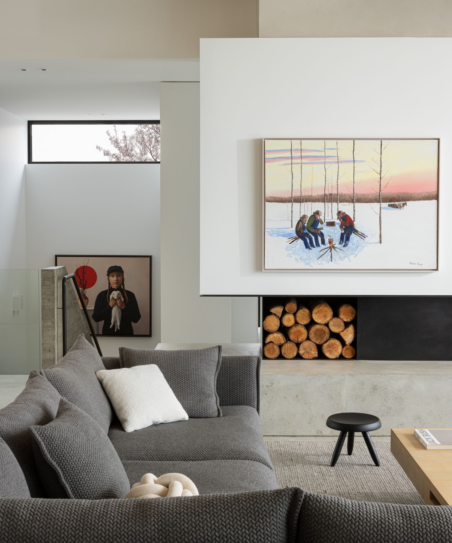 living room with concrete floor and fireplace