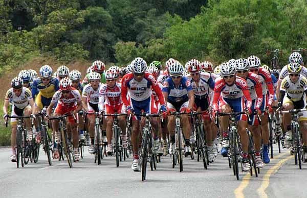 Moises Hernandez (BCR-Pizza Hut-KHS-Powerade) leads the peloton through Grecia.