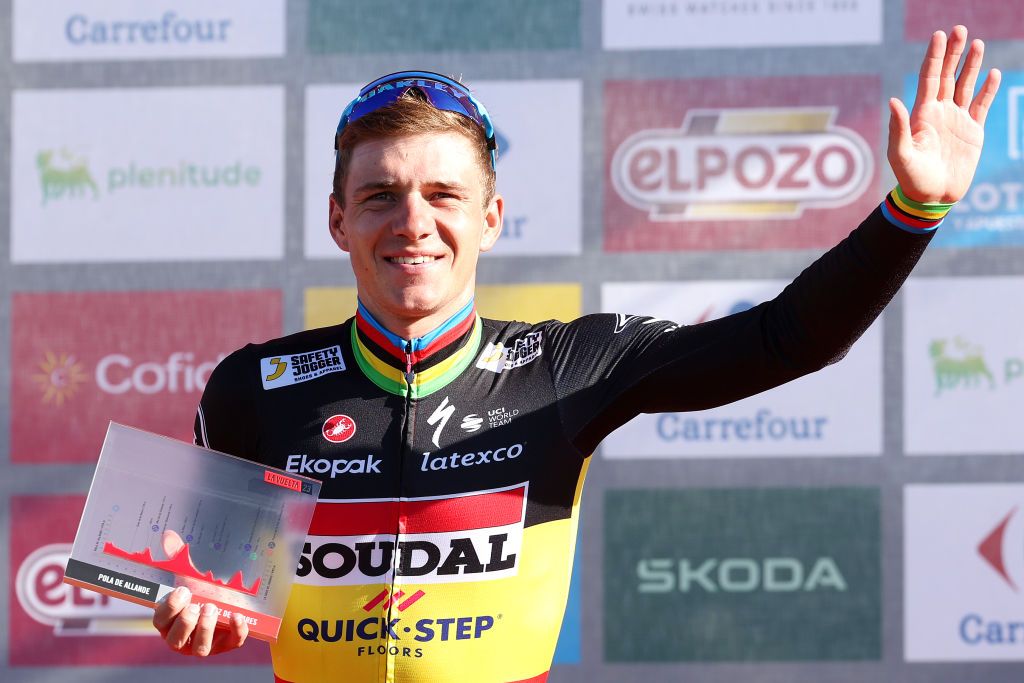 LACRUZDELINARES SPAIN SEPTEMBER 14 Remco Evenepoel of Belgium and Team Soudal Quick Step celebrates at podium as stage winner during the 78th Tour of Spain 2023 Stage 18 a 1789km stage from Pola de Allande to La Cruz de Linares 840m UCIWT on September 14 2023 in La Cruz de Linares Spain Photo by Alexander HassensteinGetty Images