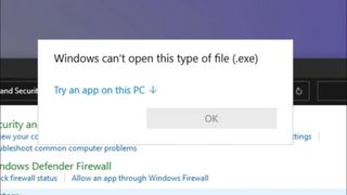 A screenshot from a YouTube video showing a Windows error, informing the user that it can no longer run .exe files