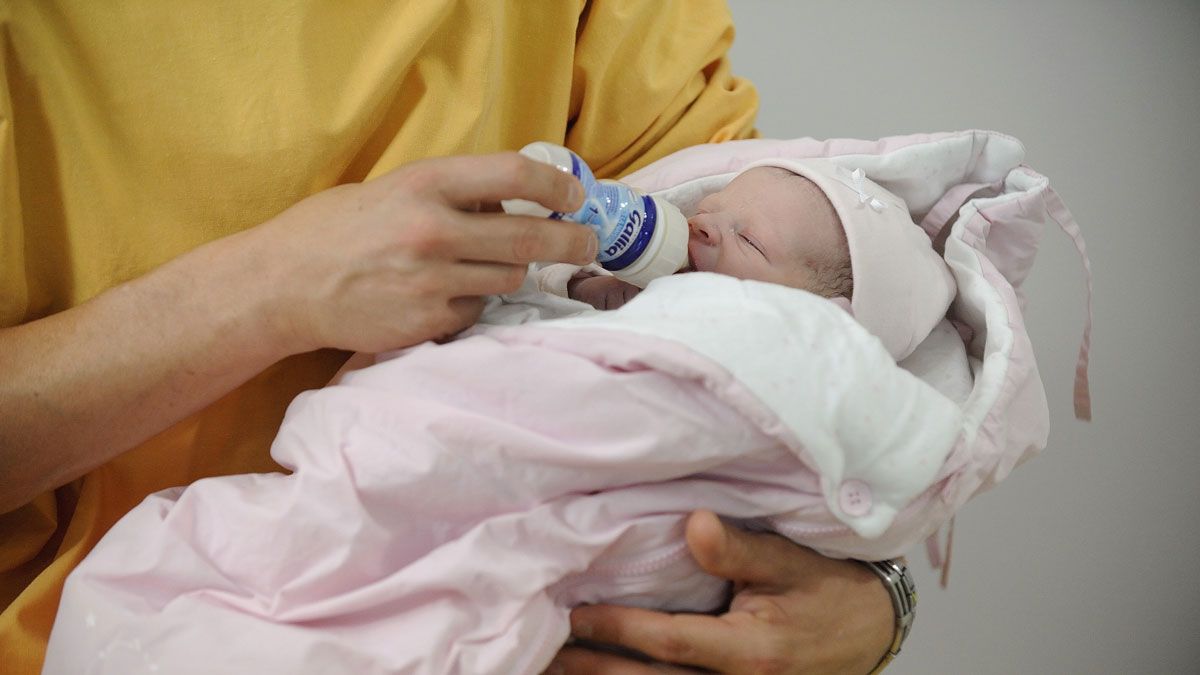 Dad holding baby