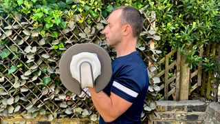 James Frew performing biceps curls with the Centr Smart Stack Adjustable Dumbbells