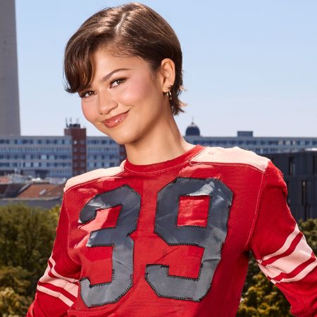 Zendaya wore a brown baby tee and the easy pant trend to see Ariana Grande's concert in NYC
