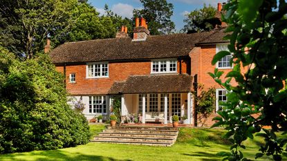 Back garden and exterior view of house