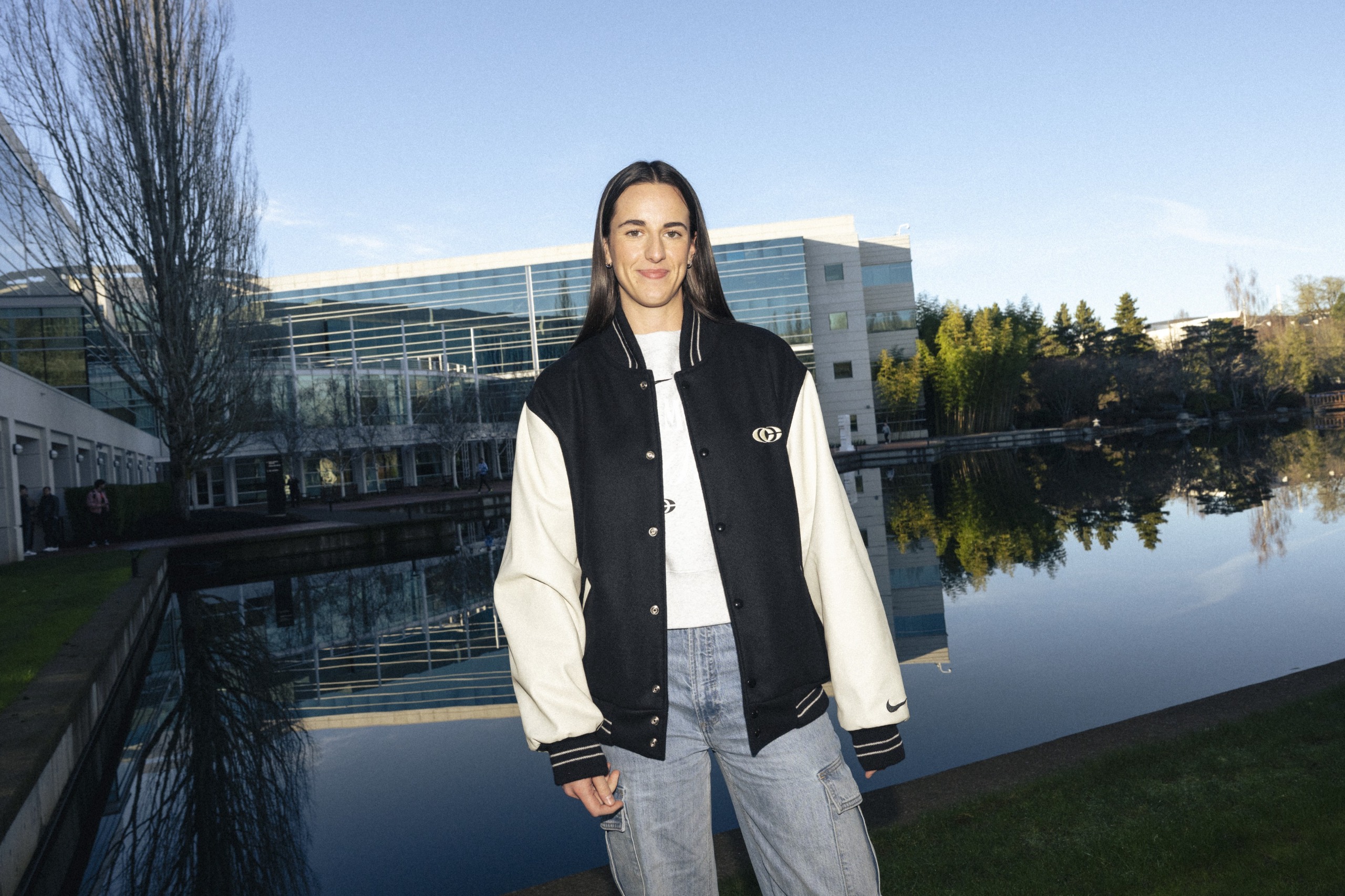 Caitlin Clark wearing a Nike jacket from her collaboration.