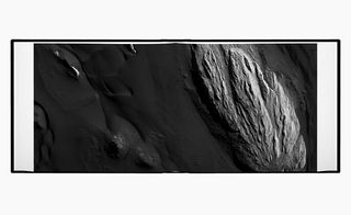 Mars plains of black sand and punctuated by dunes