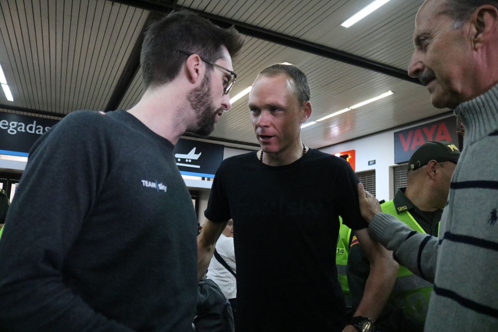 Chris Froome is greeted by the president of the Colombian Federation