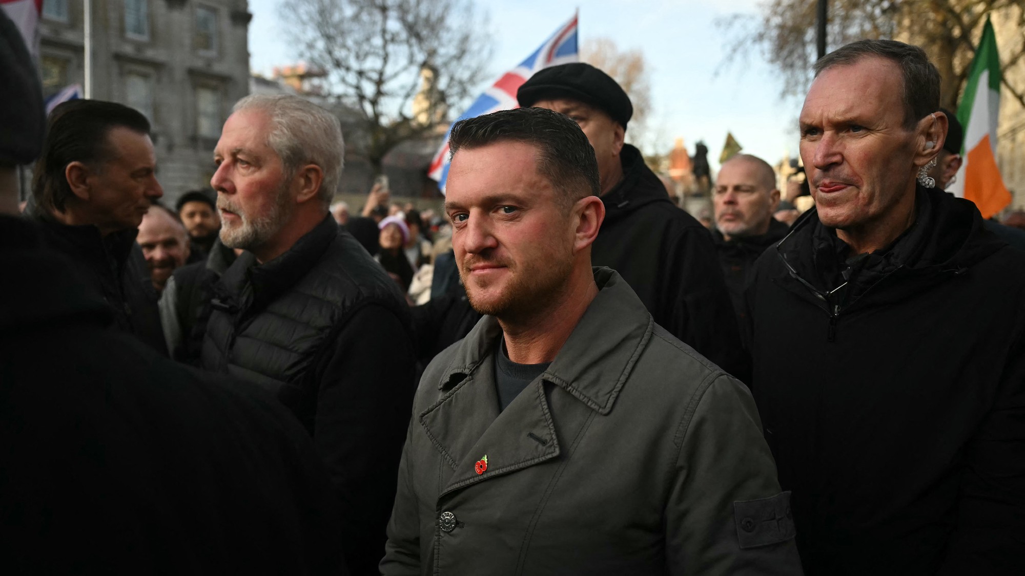 Tommy Robinson arrives at Whitehall in central London to hold an outdoor carol concert