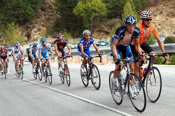 Jason McCartney (Discovery Channel) leads the 11-man move.