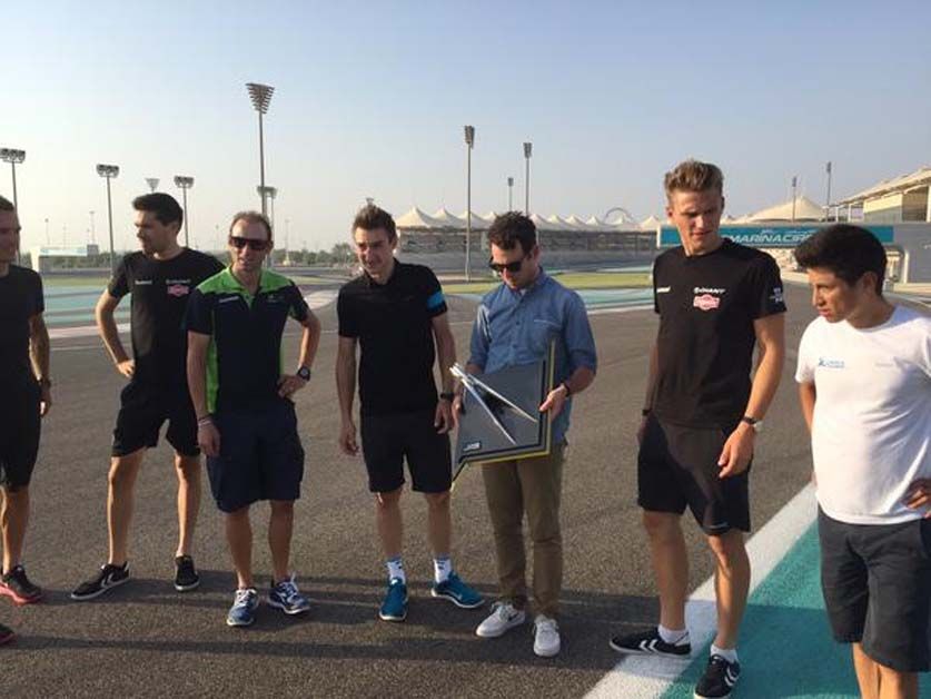 The key riders gather out on track