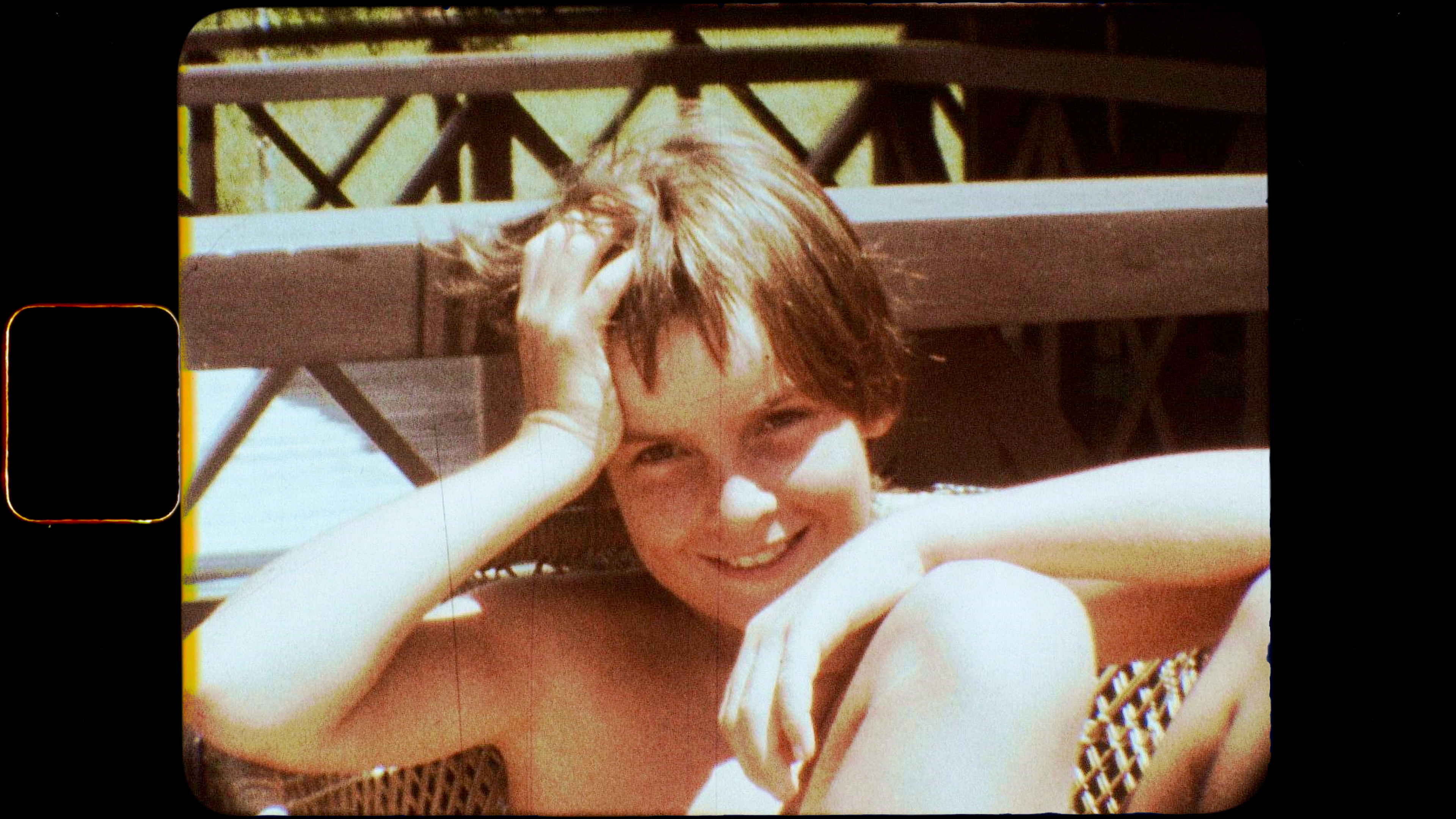An old photograph of a young Charlie Sheen in the documentary aka Charlie Sheen.