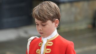 Prince George arrives ahead of the Coronation of King Charles III and Queen Camilla