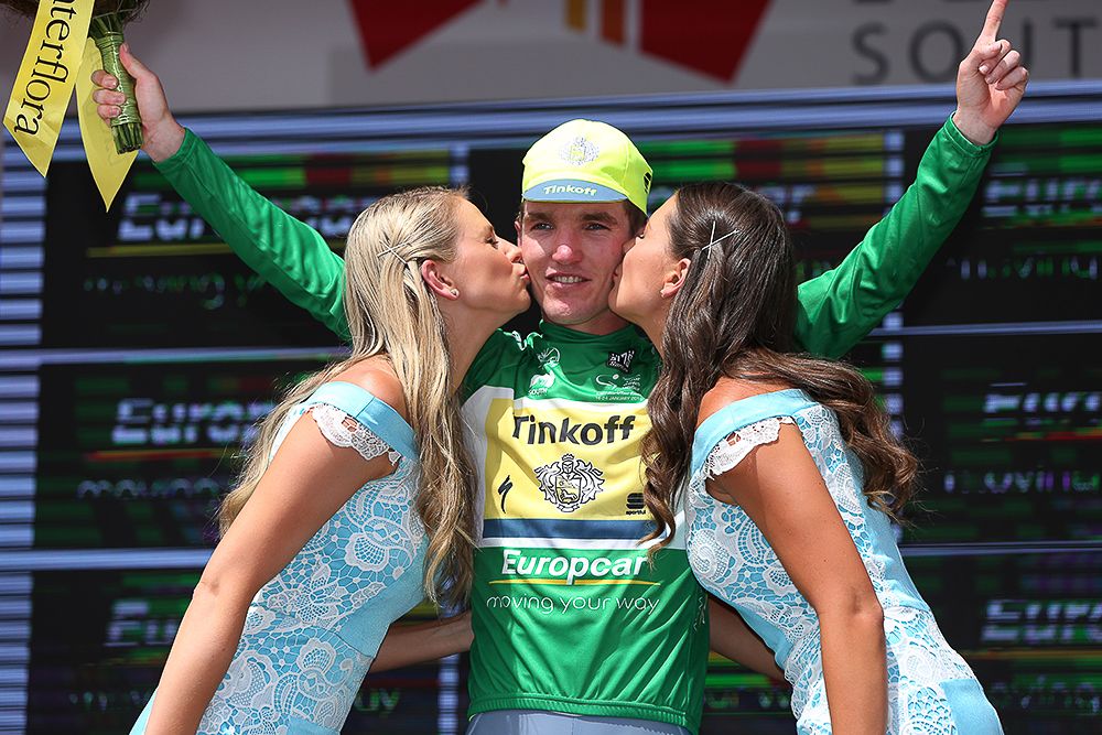 Jay McCarthy in green on the stage 3 podium.