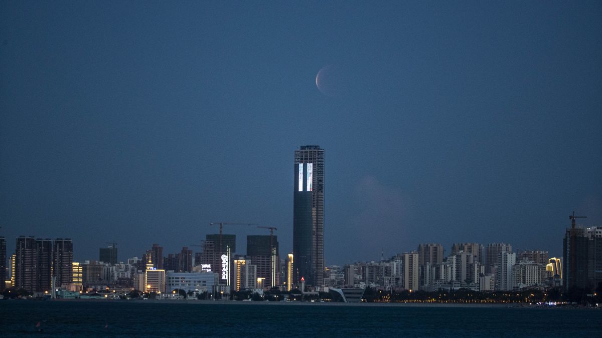 The total lunar eclipse of May 26, 2021, as seen above Haikou, in China's Hainan Province.
