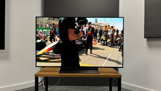 LG C4 (OLED48C4) 48-inch TV straight on with F1 race grid on screen