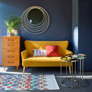 Two seater Mustard Gold velvet sofa in Living Room