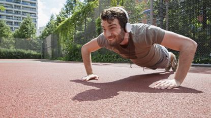 Sweaty man doing a press up