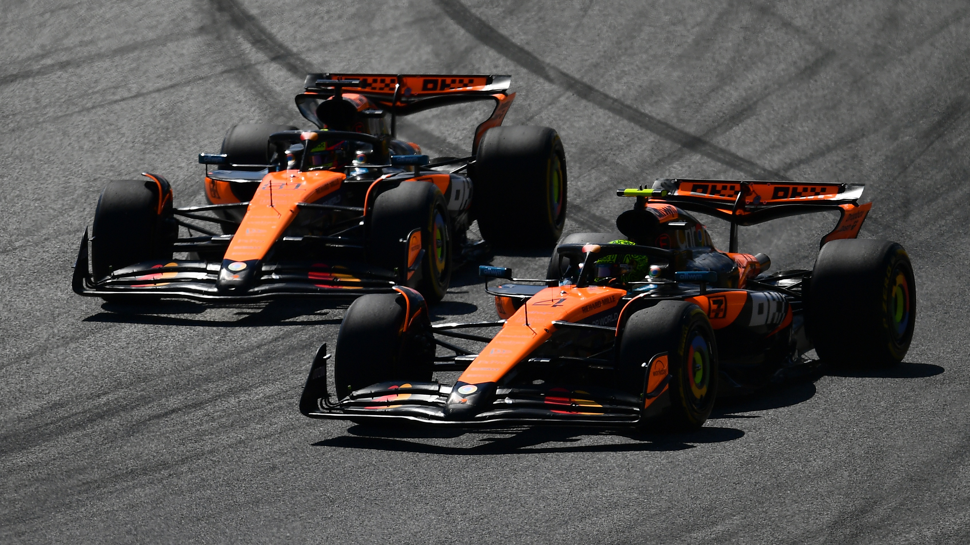 Lando Norris of Great Britain driving the (4) McLaren MCL39 Mercedes and Oscar Piastri of Australia driving the (81) McLaren MCL39 Mercedes battle for track position on track during the F1 Grand Prix of Austria at Red Bull Ring on June 29, 2025 in Spielberg, Austria.