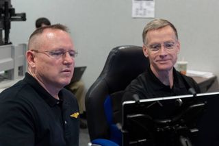 Former NASA astronaut Chris Ferguson (right), now with Boeing, has withdrawn as commander of the company's first crewed Starliner spacecraft test flight. NASA astronaut Barry "Butch" Wilmore (left) will replace him.