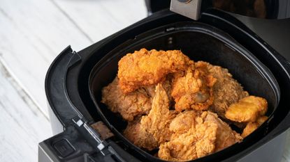 Air frying chicken in an air fryer basket