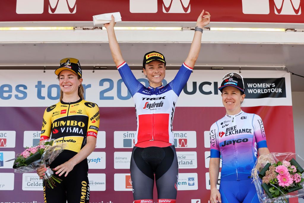 SITTARD WATERSLEY NETHERLANDS SEPTEMBER 03 LR Riejanne Markus of Netherlands and Jumbo Visma Team on second place stage winner Audrey CordonRagot of France and Team Trek Segafredo and Amanda Spratt of Australia and Team BikeExchange Jayco on third place pose on the podium ceremony after the 25th Simac Ladies Tour 2022 Stage 5 a 178km individual time trial stage from Windraak to Sittard Watersley SLT2022 UCIWWT on September 03 2022 in Sittard Watersley Netherlands Photo by Bas CzerwinskiGetty Images