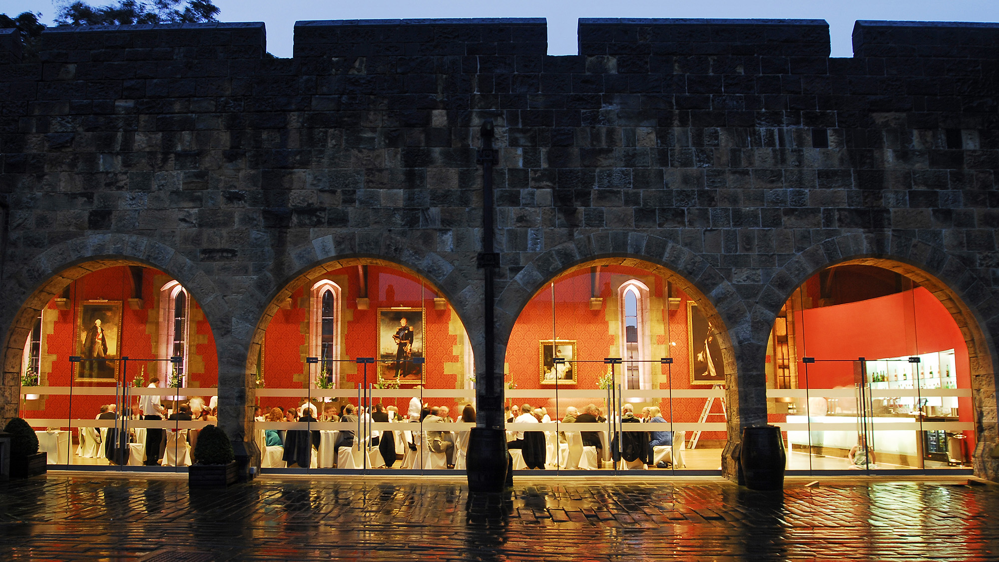 Wedding reception, inside a castle, shot from outside