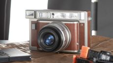 Lomo Instant Wide Glass instant camera in a studio