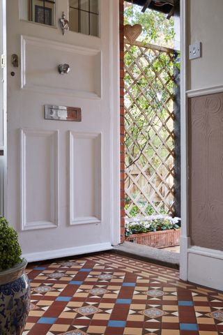 Encaustic effect tiles in a Victorian hallway