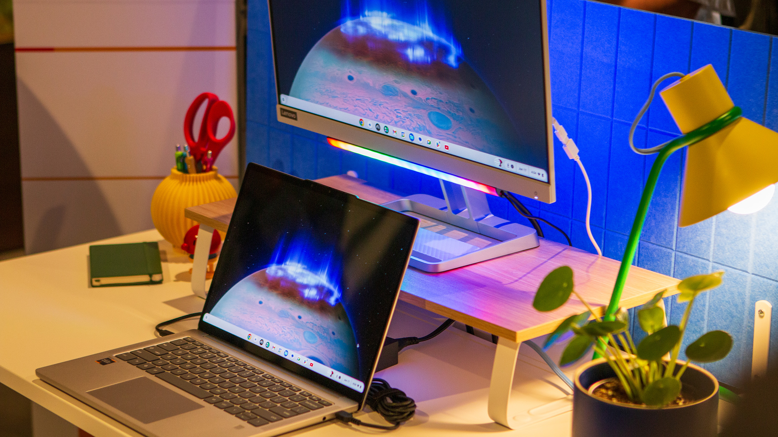 Lenovo Chromebook Plus 14 on a desk connected to a monitor