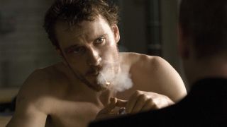 Michael Fassbender smoking a cigarette in Hunger