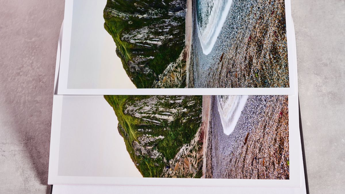 A page from the Snapfish photo book is placed on top of the same page from the Shutterfly book to show the difference in color.