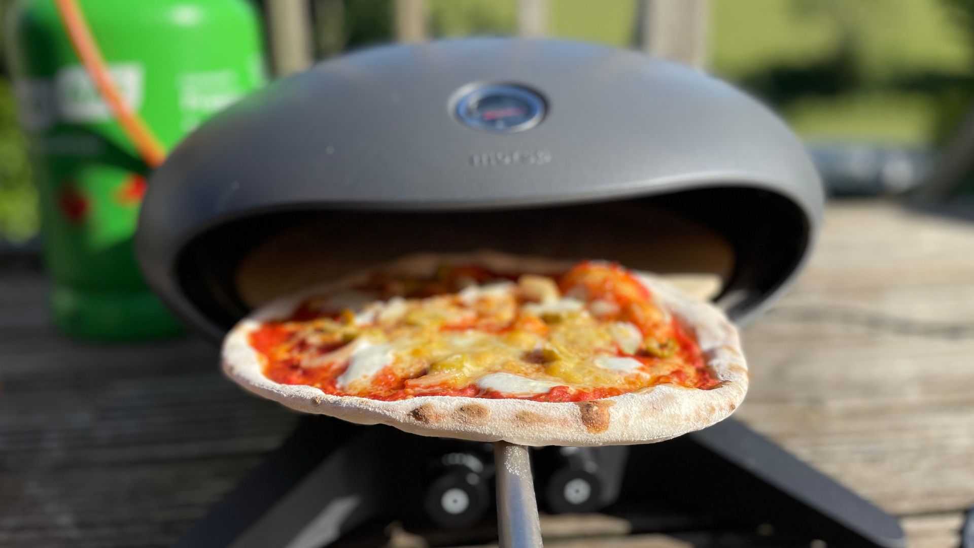 Pizza coming out of the Morso Forno Spin