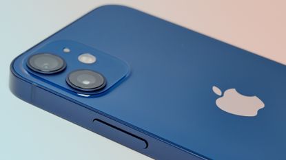 Apple iPhone 12 mini in blue on colour background