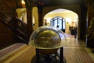 The globe at the rear of the Explorers Club lobby