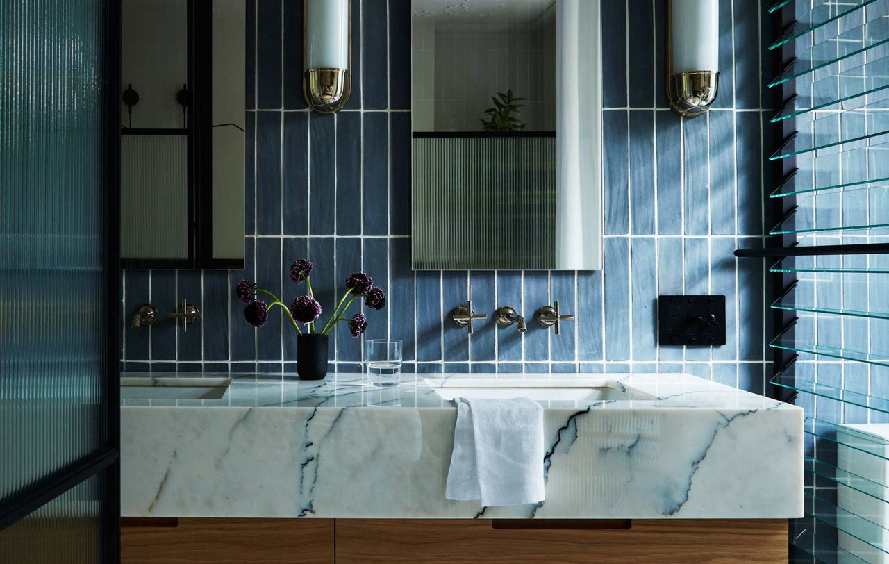 A small bathroom with floating vanity