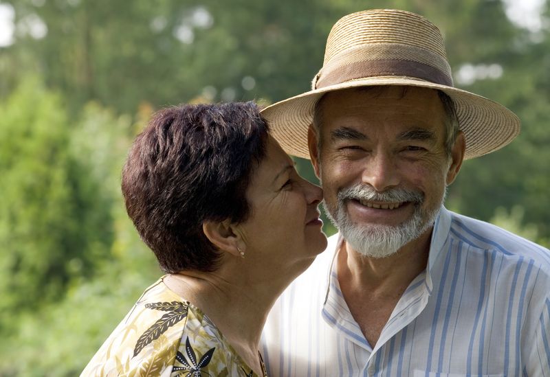 Senior couple kissing