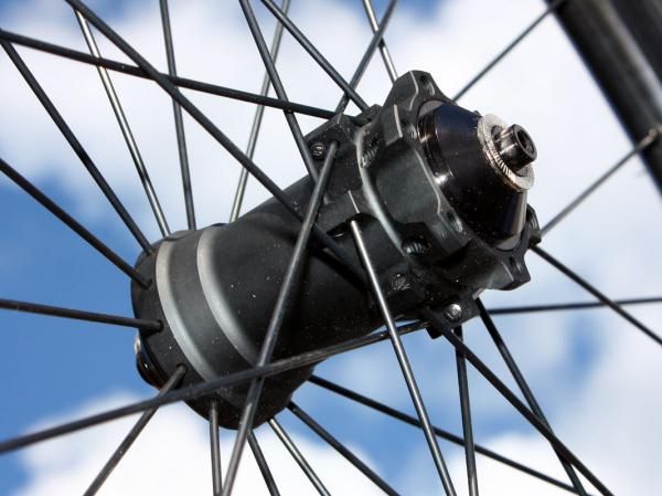 Reynolds' new AM mountain bike wheel uses an Asian-sourced front hub with interchangeable axle fitments.