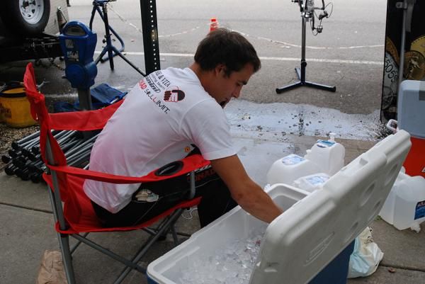 The Amore &amp; Vita soigneur ices down some bottles.