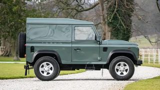 Green, three door Land Rover Defender