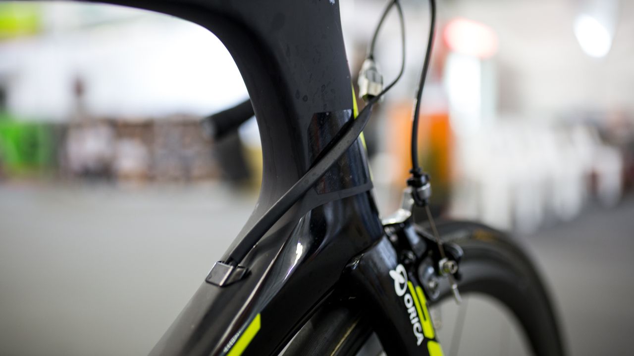 A small sticker protects the frame from any cable rub