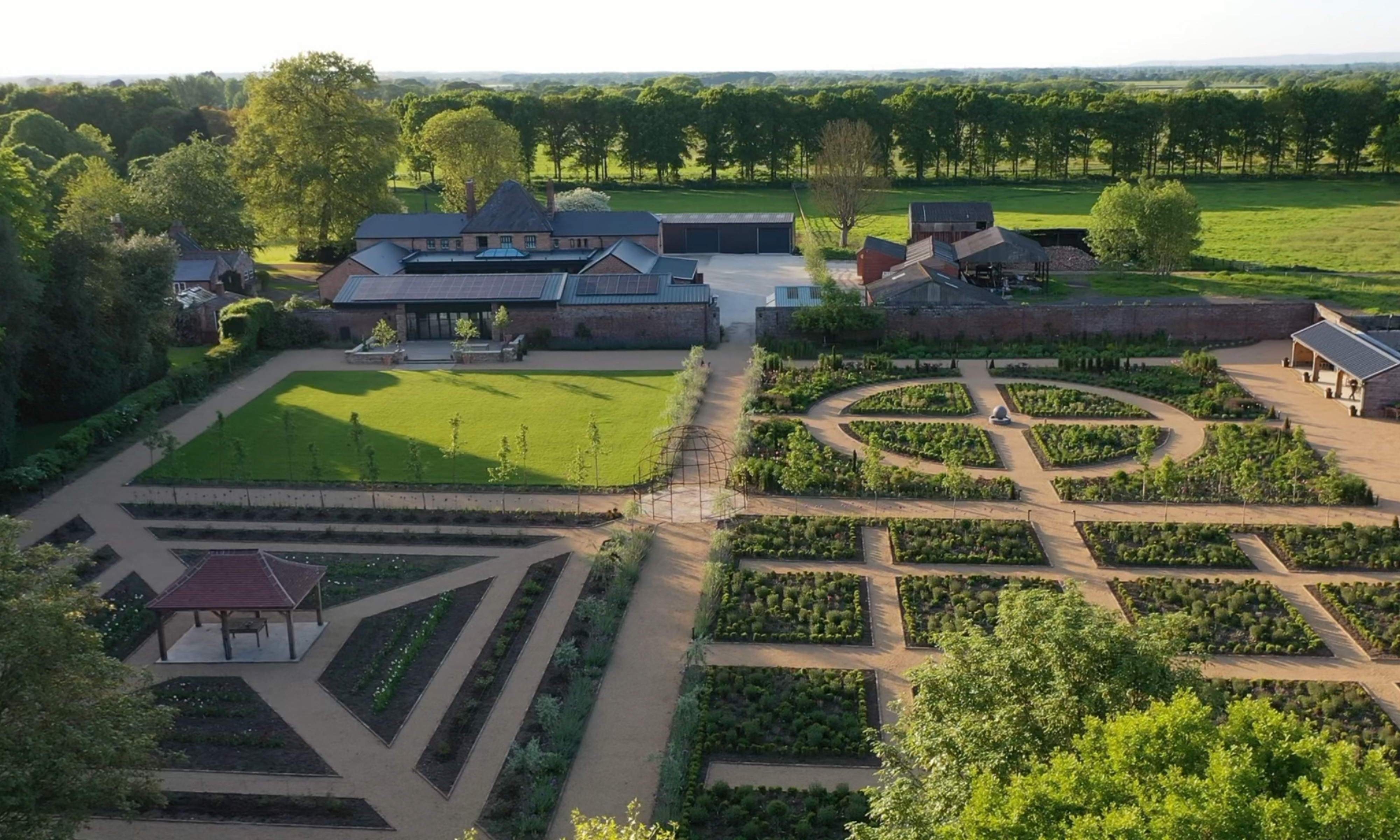 Image from above of walled garden with four distinct areas