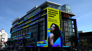 A Spotify billboard with Charli xcx