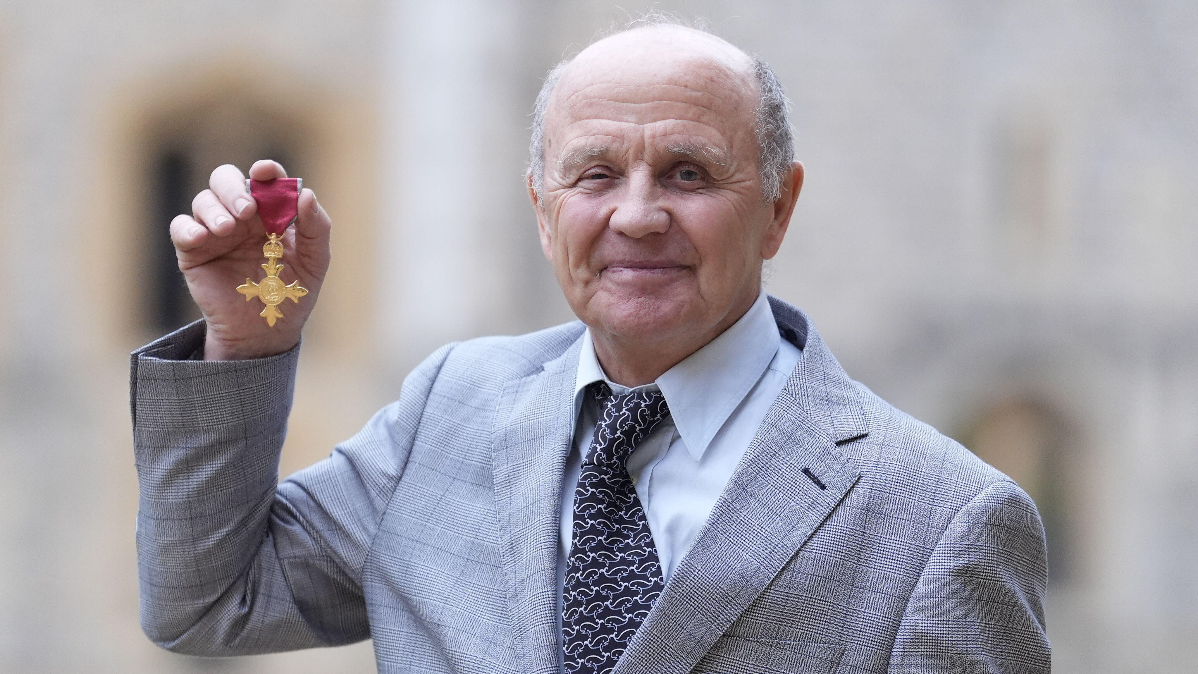 Douglas Allan after being made an Officer of the Order of the British Empire (OBE) by the Princess Royal during an Investiture ceremony at Windsor Castle. October 29, 2024.